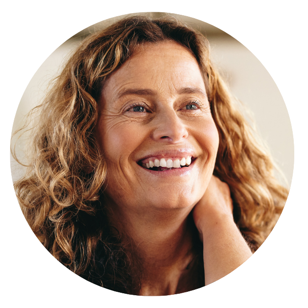 Portrait of Marg smiling, a Juicy Roll Method student
